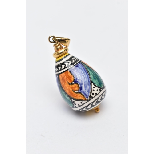 117 - A YELLOW METAL AND CERAMIC PENDANT, polychrome ceramic tear drop pendant detailed with green, blue, ... 