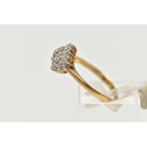 16 - A 9CT YELLOW GOLD, DIAMOND CLUSTER RING, of a marquise shape, set with single cut diamonds, pinched ... 