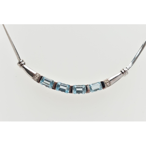 29 - A 9CT GOLD, TOPAZ NECKLACE, a solid white gold crecent shaped bar, set with four emerald cut blue to... 