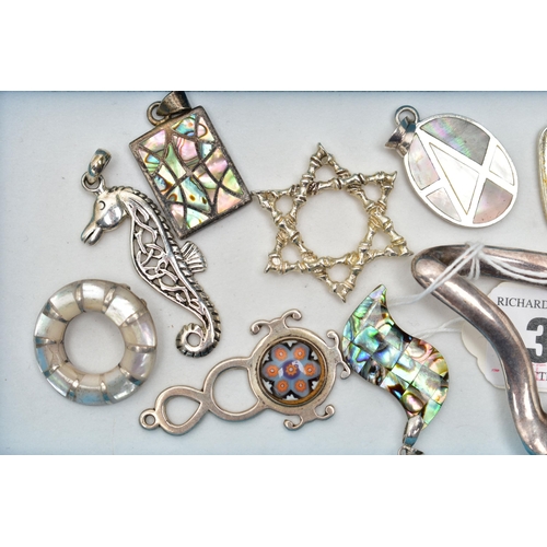 30 - A SELECTION OF SILVER AND WHITE METAL JEWELLERY, to include a white seahorse pendant stamped 925, a ... 