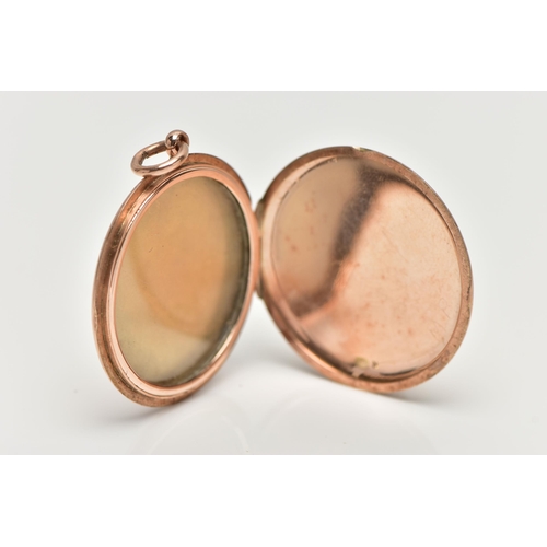 4 - A ROSE TONE LOCKET, of a circular polished form, opens to reveal a glass covered vacant photo compar... 