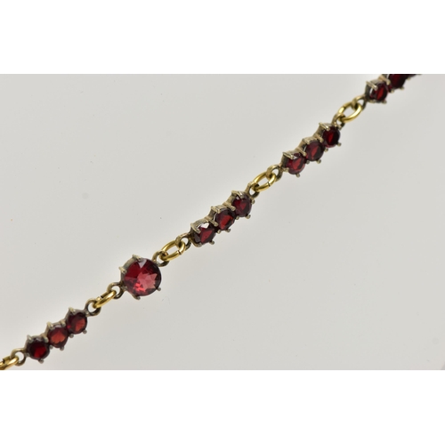 41 - A YELLOW METAL DIAMOND AND SAPPHIRE FIVE STONE RING AND A GARNET NECKLACE, the ring designed with th... 