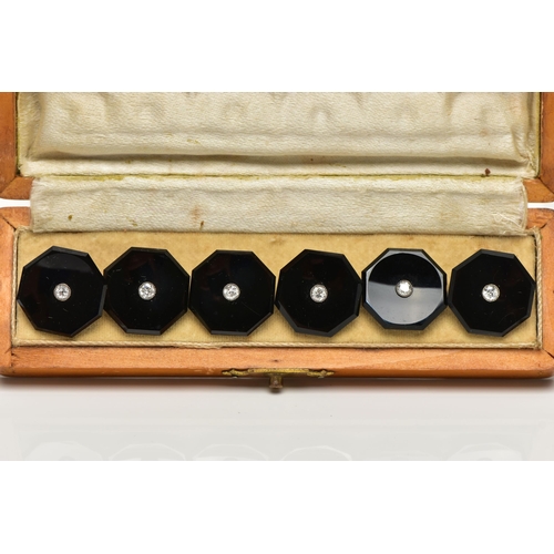 43 - A CASED SET OF SIX MID 20TH CENTURY, ONYX AND DIAMOND DRESS STUDS, each highly polished onyx studs o... 