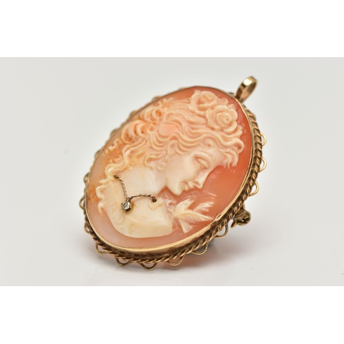 45 - A 9CT GOLD HABILLE CAMEO BROOCH, carved oval shell cameo, depicting a lady in profile, dressed with ... 