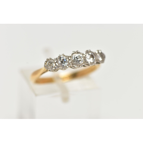 55 - A YELLOW METAL, FIVE STONE DIAMOND RING, set with five graduating, old cut diamonds, estimated total... 