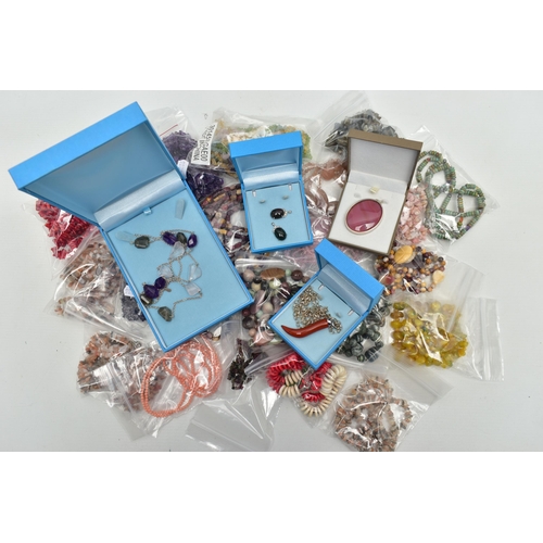 101 - A LARGE COLLECTION OF SEMI-PRECIOUS GEMSTONE JEWELLERY, to include a boxed pink agate pendant, in a ... 