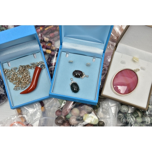 101 - A LARGE COLLECTION OF SEMI-PRECIOUS GEMSTONE JEWELLERY, to include a boxed pink agate pendant, in a ... 