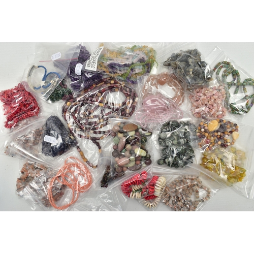 101 - A LARGE COLLECTION OF SEMI-PRECIOUS GEMSTONE JEWELLERY, to include a boxed pink agate pendant, in a ... 
