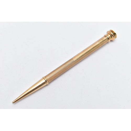 23 - A YELLOW METAL PROPELLING PENCIL, engine turned pattern stamped '9ct gold', AF terminal, length 115m... 