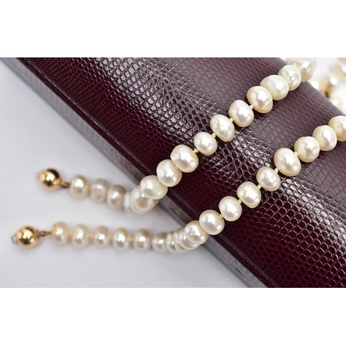 33 - TWO CULTURED PEARL BRACELETS, two baroque cultured pearl bracelets, each pearl is individually knott... 