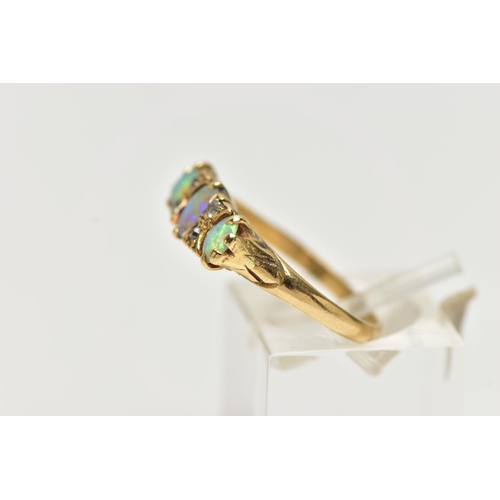 40 - AN EARLY 20TH CENTURY 18CT GOLD, OPAL AND DIAMOND RING, designed with three oval opal cabochons, eac... 