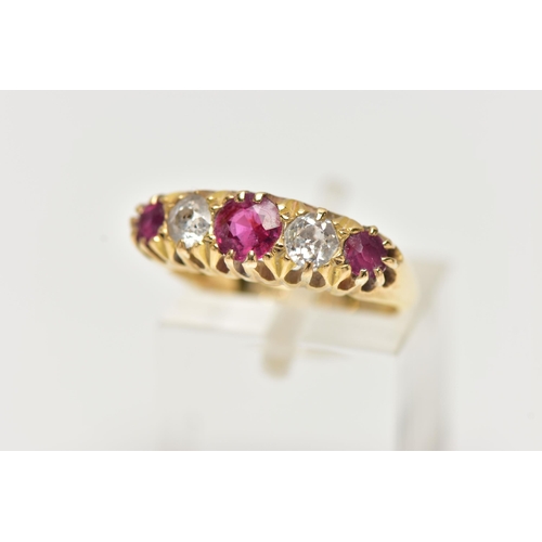 42 - AN EARLY 20TH CENTURY 18CT GOLD, RUBY AND DIAMOND RING, designed with three circular cut rubies, int... 