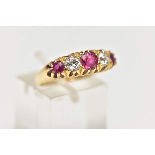 42 - AN EARLY 20TH CENTURY 18CT GOLD, RUBY AND DIAMOND RING, designed with three circular cut rubies, int... 