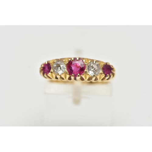 42 - AN EARLY 20TH CENTURY 18CT GOLD, RUBY AND DIAMOND RING, designed with three circular cut rubies, int... 