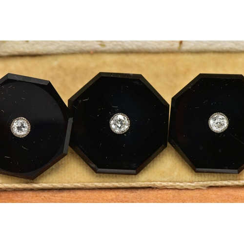 43 - A CASED SET OF SIX MID 20TH CENTURY, ONYX AND DIAMOND DRESS STUDS, each highly polished onyx studs o... 