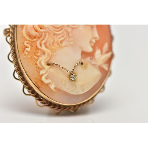 45 - A 9CT GOLD HABILLE CAMEO BROOCH, carved oval shell cameo, depicting a lady in profile, dressed with ... 