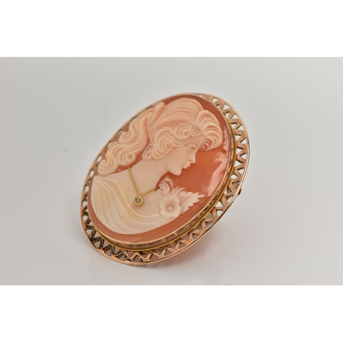 46 - A 9CT GOLD HABILLE CAMEO BROOCH, carved oval shell cameo, depicting a lady in profile, dressed with ... 