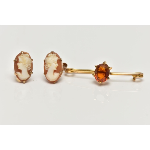 47 - A CITRINE BROOCH AND A PAIR OF CAMEO EARRINGS, the brooch claw set with an oval cut citrine, to the ... 