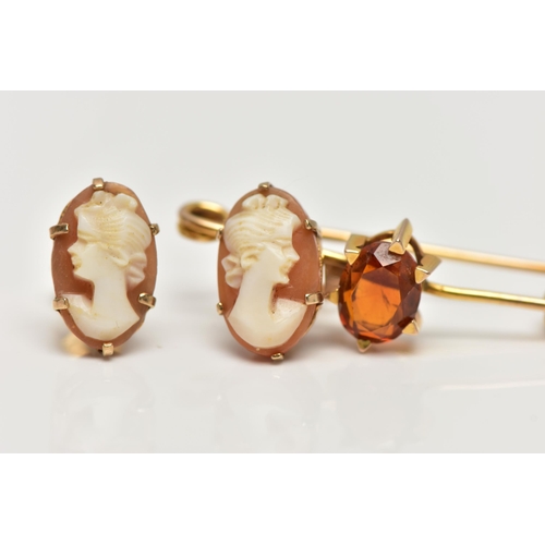 47 - A CITRINE BROOCH AND A PAIR OF CAMEO EARRINGS, the brooch claw set with an oval cut citrine, to the ... 