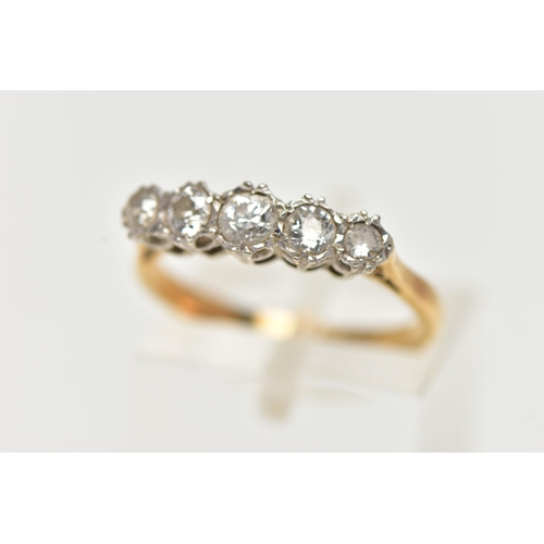 55 - A YELLOW METAL, FIVE STONE DIAMOND RING, set with five graduating, old cut diamonds, estimated total... 