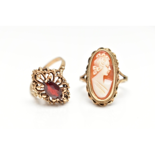 62 - TWO 9CT GOLD RINGS, the first a marquise cut garnet set within an open work beaded mount with a high... 