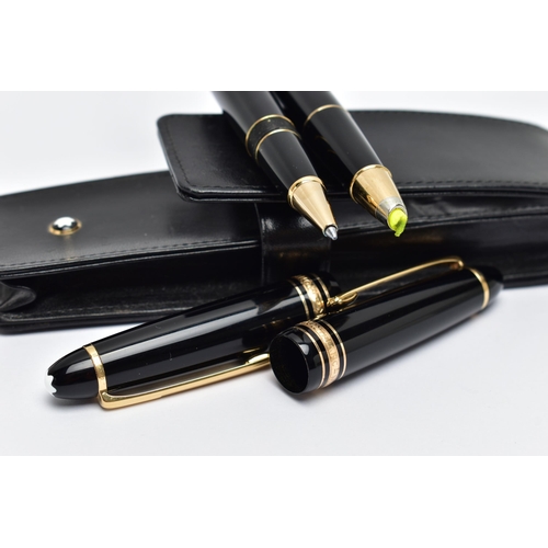 67 - A CASED SET OF TWO 'MONTBLANC' PENS, to include a black lacquer and gold trim ball point pen, signed... 