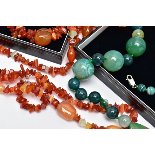 77 - TWO STATEMENT SEMI-PRECIOUS GEMSTONE BEAD NECKLACES, the first a triple row of vari cut carnelian be... 