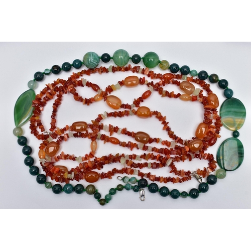 77 - TWO STATEMENT SEMI-PRECIOUS GEMSTONE BEAD NECKLACES, the first a triple row of vari cut carnelian be... 