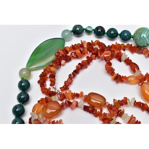 77 - TWO STATEMENT SEMI-PRECIOUS GEMSTONE BEAD NECKLACES, the first a triple row of vari cut carnelian be... 