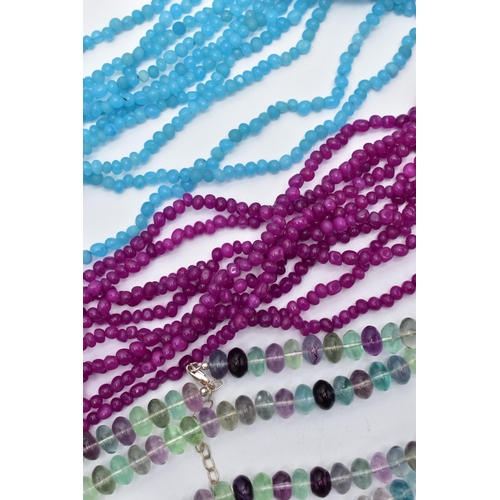 78 - THREE BOXED SEMI-PRECIOUS GEMSTONE BEAD NECKLACES, to include a long single row of alternating colou... 