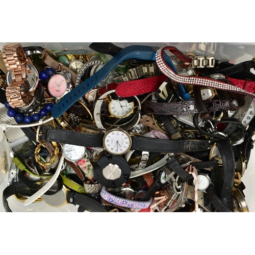 97 - A PLASTIC BOX OF ASSORTED LADY'S AND GENT'S FASHION WRISTWATCHES, mostly quartz movements, names to ... 