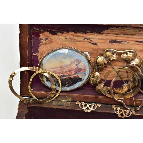 98 - A SELECTION OF MAINLY VICTORIAN BROOCH FRAMES, mainly gold plated, to include many of scrolling desi... 