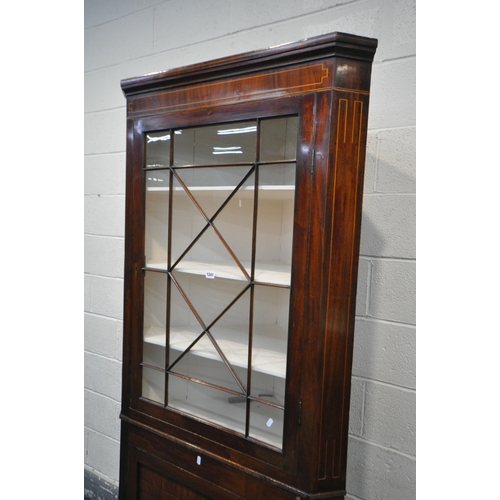 1196 - A GEORGIAN MAHOGANY AND INLAID CORNER CUPBOARD, the top section with a single astragal glazed door t... 