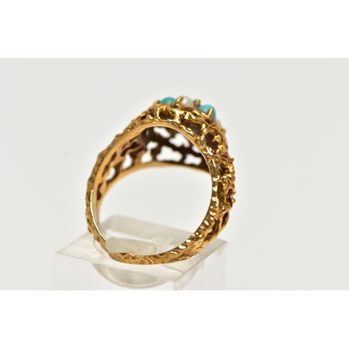 14 - A YELLOW METAL GEMSET DOME RING, a textured open work ring, cluster set with three split pearls and ... 