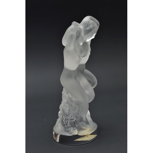 113 - A LALIQUE FROSTED AND MOULDED GLASS STAUETTE LE FAUNE, etched 'Lalique France' to the base and with ... 