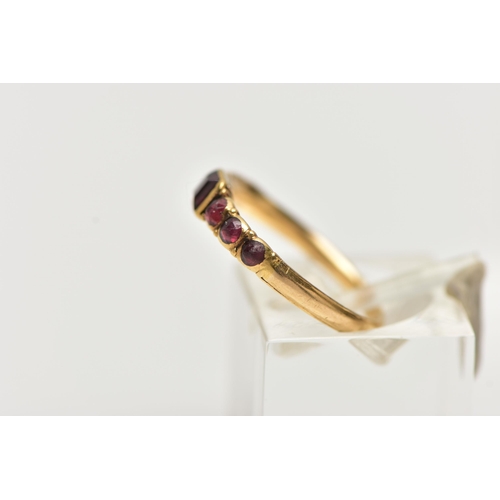 1 - A YELLOW GOLD GEORGIAN GARNET RING, the rectangular cut garnet flanked to each side by three garnet ... 