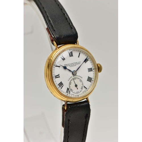 11 - AN EARLY 20TH CENTURY 18CT YELLOW GOLD BIRCH AND GAYDON LTD MANUAL WIND WRISTWATCH, the white enamel... 