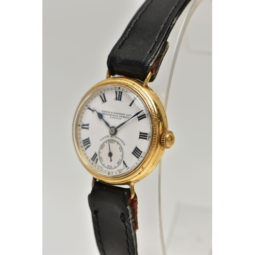 11 - AN EARLY 20TH CENTURY 18CT YELLOW GOLD BIRCH AND GAYDON LTD MANUAL WIND WRISTWATCH, the white enamel... 