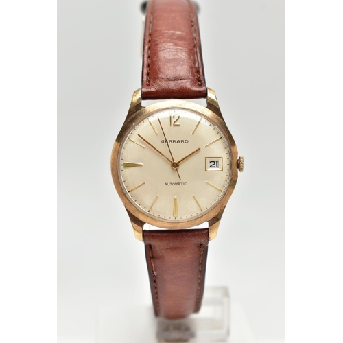 13 - THREE WATCHES, to include a 1960s 9ct yellow gold manual wind GARRARD wristwatch, cream dial with gi... 