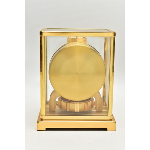 151 - A JAEGER-LE COULTRE 'ATMOS' MANTEL CLOCK, serial number 560516, in a brass and five panel glazed rec... 