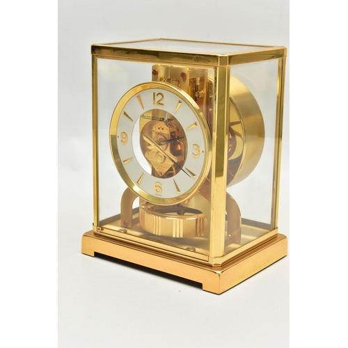 151 - A JAEGER-LE COULTRE 'ATMOS' MANTEL CLOCK, serial number 560516, in a brass and five panel glazed rec... 