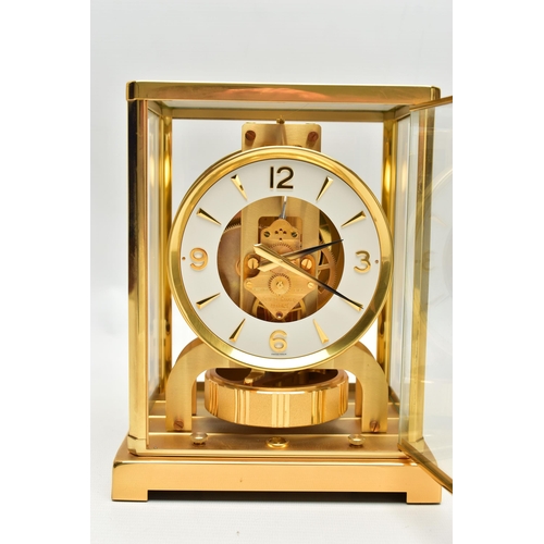 151 - A JAEGER-LE COULTRE 'ATMOS' MANTEL CLOCK, serial number 560516, in a brass and five panel glazed rec... 