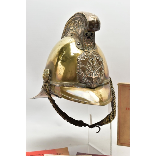 152 - A VICTORIAN BRASS MERRYWEATHER TYPE FIREMAN'S HELMET, with a worn leather and brass chin strap and l... 