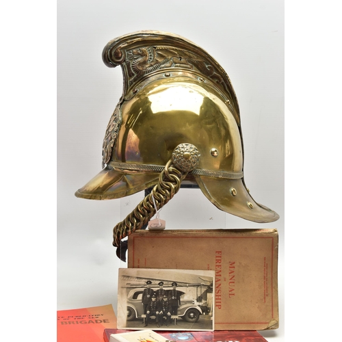 152 - A VICTORIAN BRASS MERRYWEATHER TYPE FIREMAN'S HELMET, with a worn leather and brass chin strap and l... 