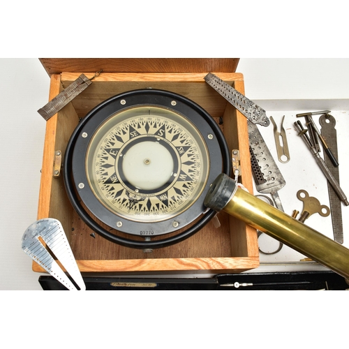 156 - A MID 20TH CENTURY JAPANESE SHIPS COMPASS HOUSED IN AN OAK CASE, the black lacquered compass in gimb... 