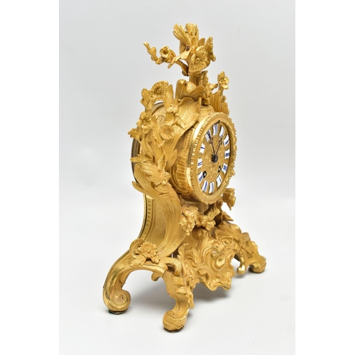 160 - A LATE 19TH CENTURY FRENCH ORMOLU MANTEL CLOCK OF FOLIATE ROCOCO SCROLL DESIGN, the circular dial wi... 