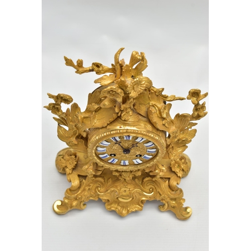 160 - A LATE 19TH CENTURY FRENCH ORMOLU MANTEL CLOCK OF FOLIATE ROCOCO SCROLL DESIGN, the circular dial wi... 