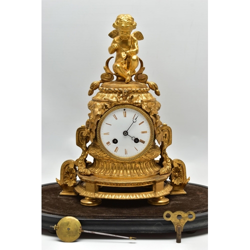 161 - A LATE 19TH CENTURY FRENCH ORMOLU MANTEL CLOCK OF SHAPED CYLINDRICAL FORM, the circular top with sea... 