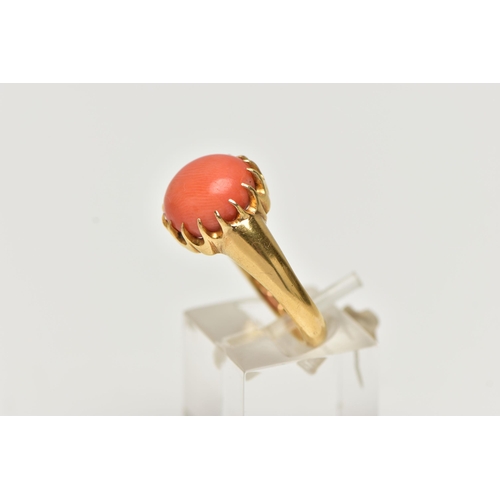 2 - AN EDWARDIAN 18CT YELLOW GOLD CORAL RING, the coral cabochon measuring approximately 11.5mm diameter... 