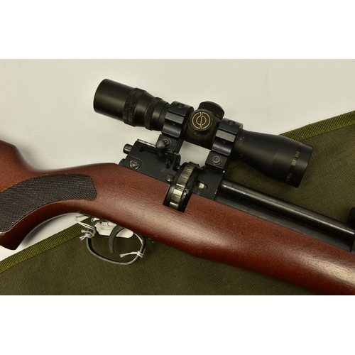 351 - A  .22 '' ROTARY MAGAZINE PUMP UP AIR RIFLE  fitted with a beech stock, in working order and excelle... 